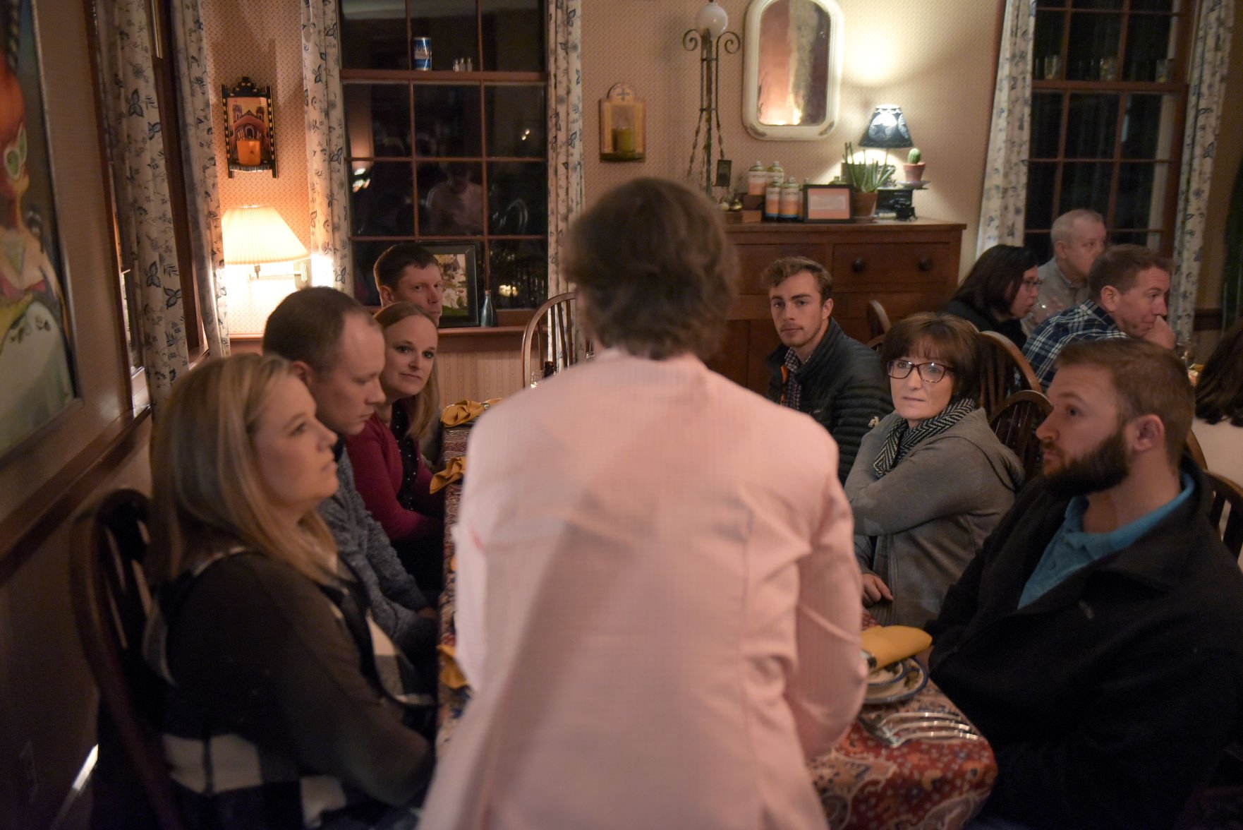 Liz Huff explains the menu to her guests